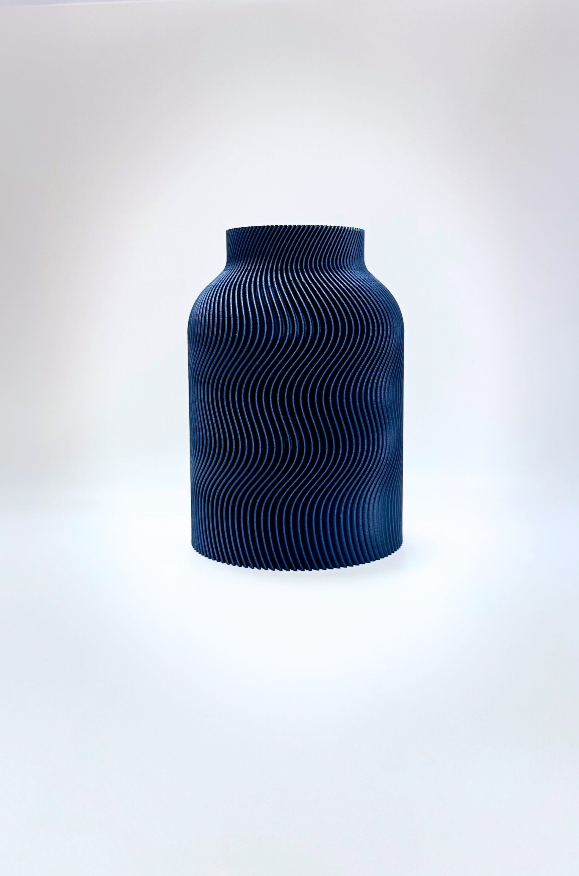 Dark Blue Luna Vase with sculptural wave texture and inner glass insert for home decoration