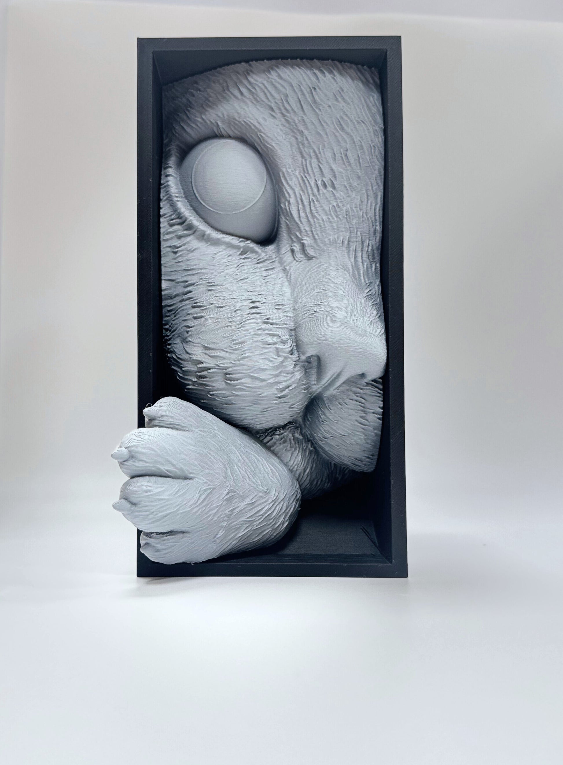 Unique and whimsical 3D printed cat bookend with realistic fur patterns