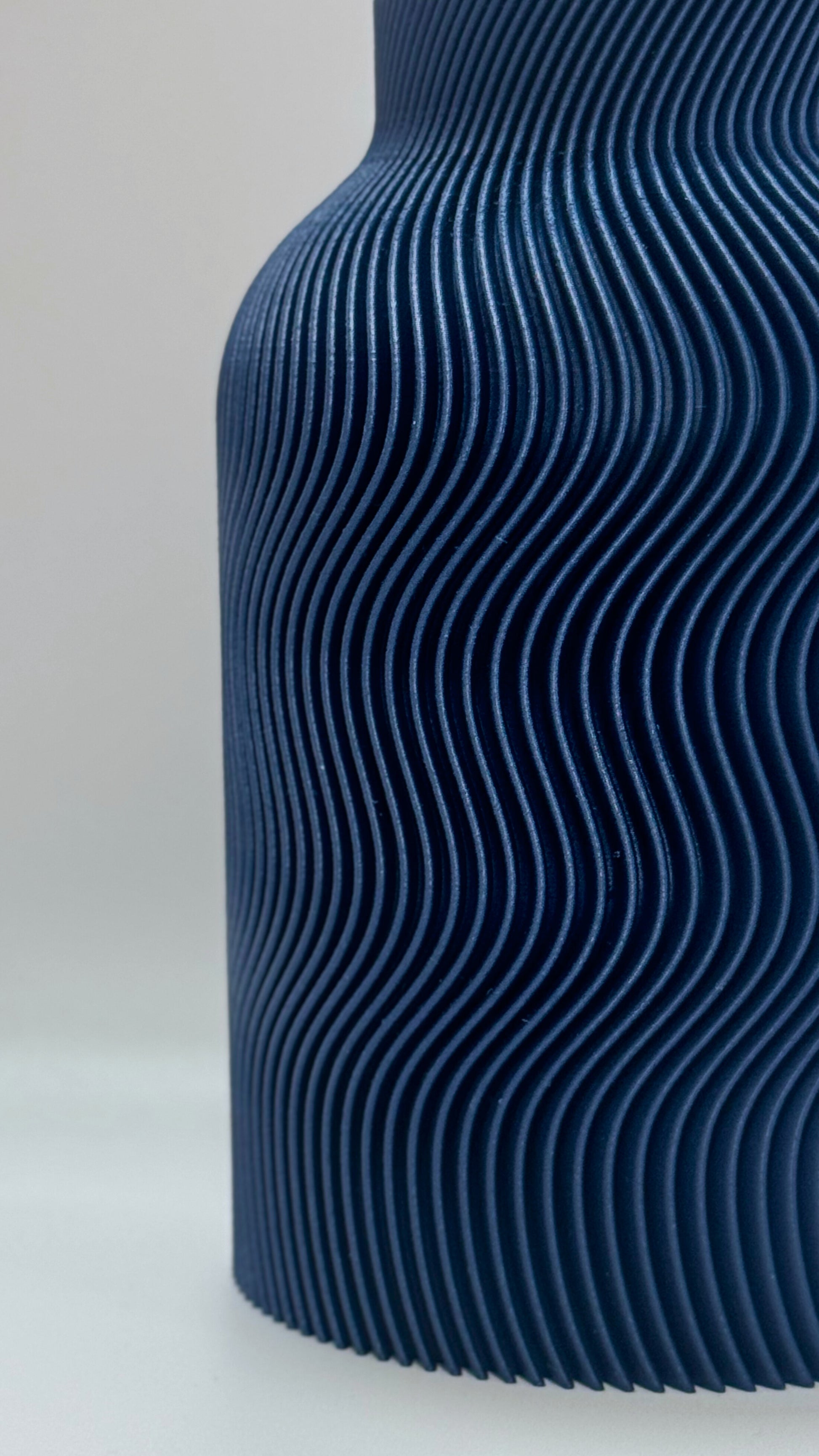 Dark Blue Luna Vase with sculptural wave texture and inner glass insert for home decoration
