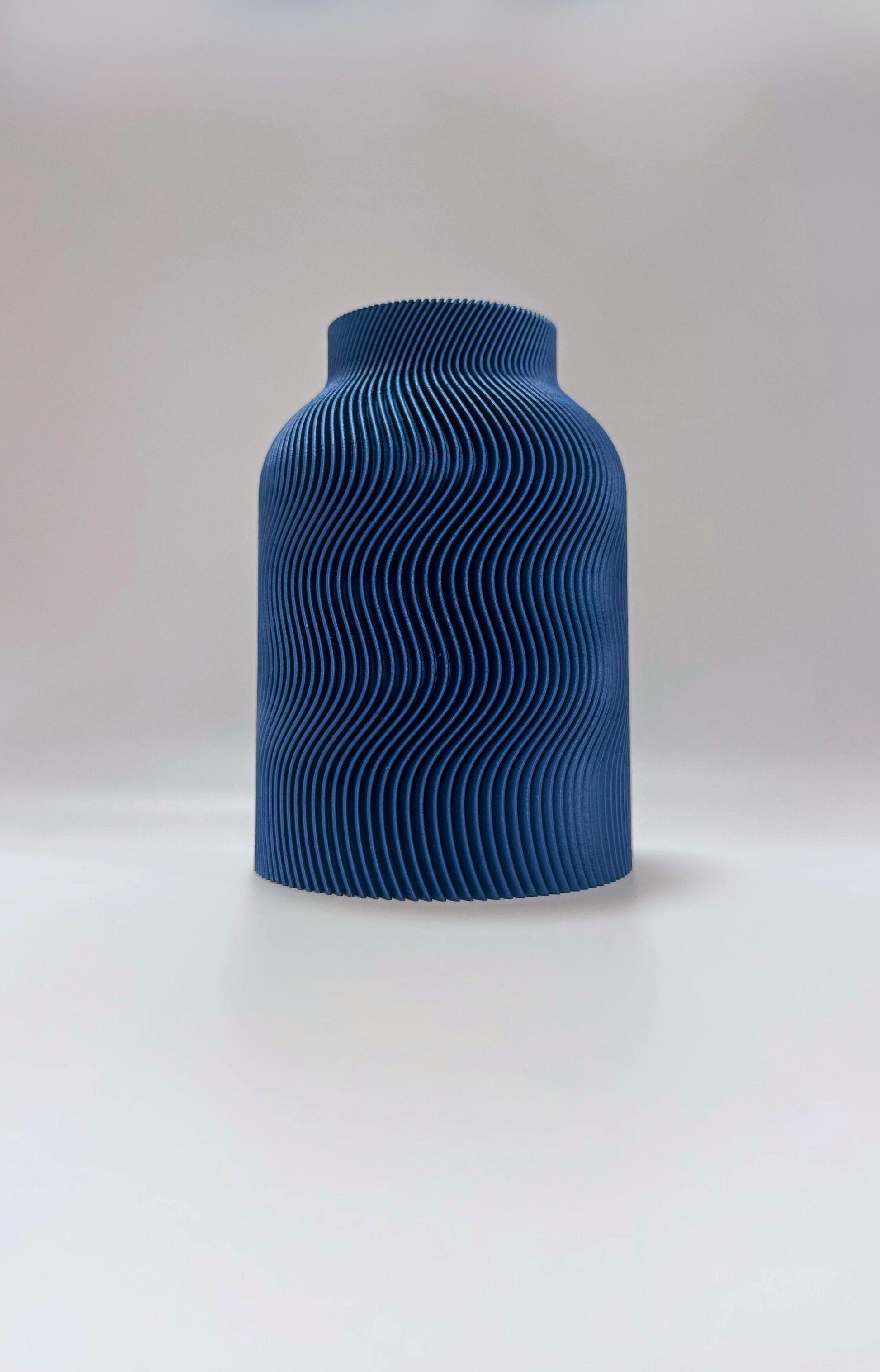 Dark Blue Luna Vase with sculptural wave texture and inner glass insert for home decoration