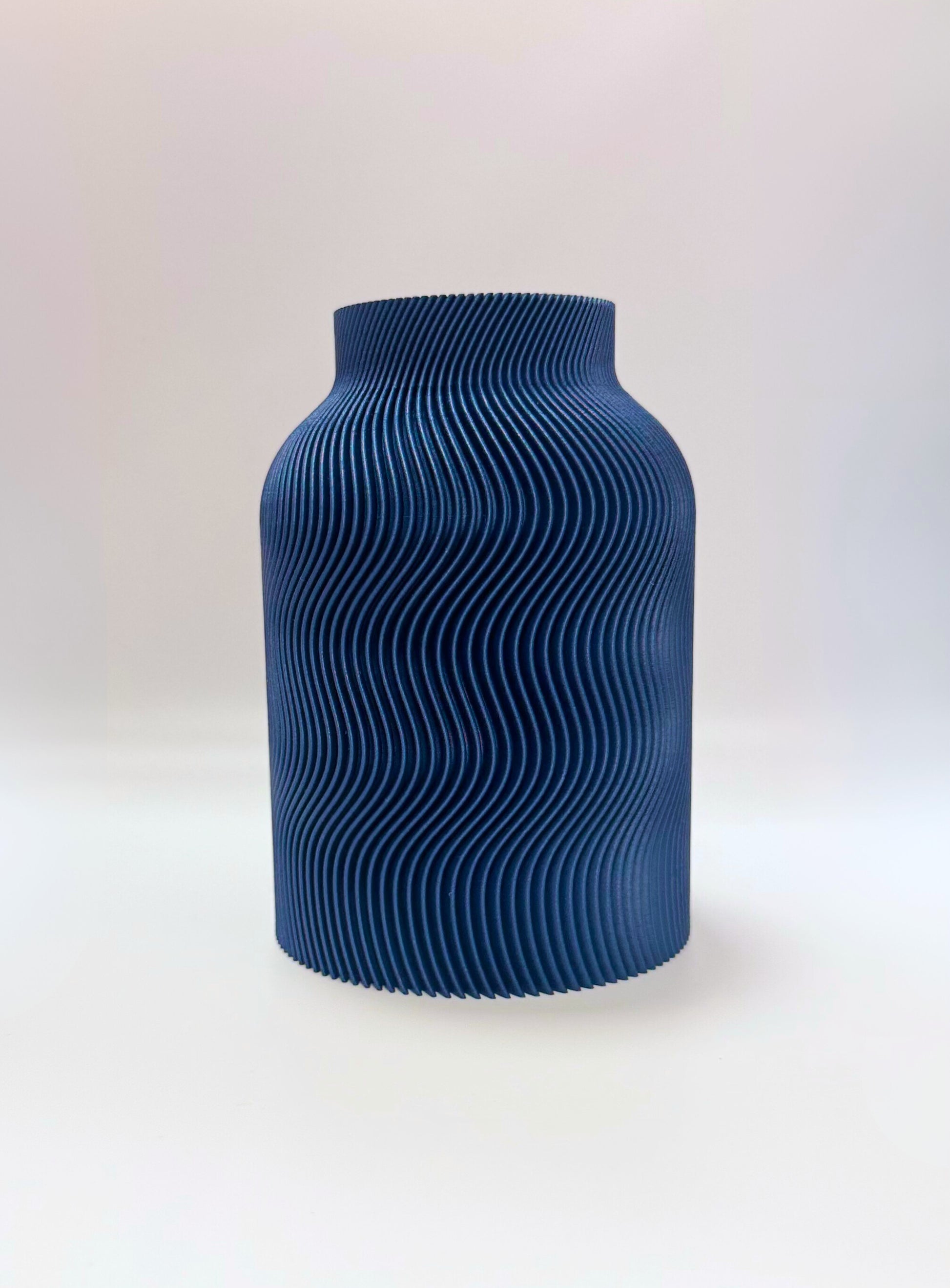 Dark Blue Luna Vase with sculptural wave texture and inner glass insert for home decoration